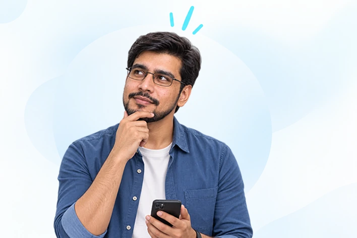Customer considering a question while holding a phone
